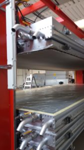 Vacuum dryer tables for processing hides